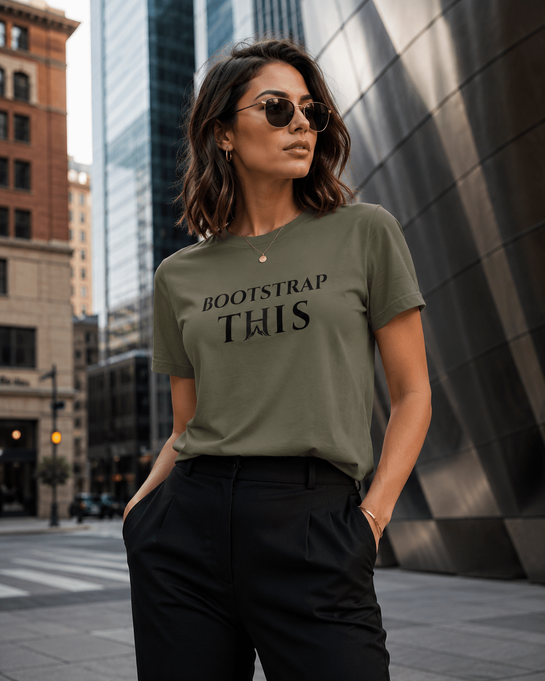 Bootstrap This Women's Relaxed Tee, model wearing the White relaxed tee in the city.
