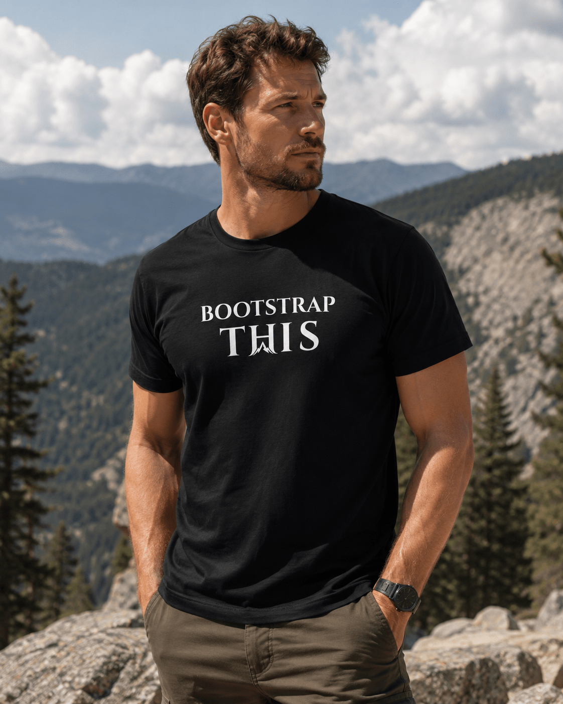 Bootstrap This Men's Tee — White Edition, model wearing the Vintage Black tee outdoors by brickwork.