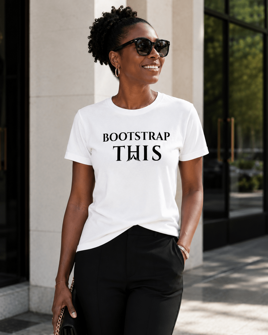 Bootstrap This Women's Relaxed Tee, model wearing the Military Green relaxed tee outdoors.