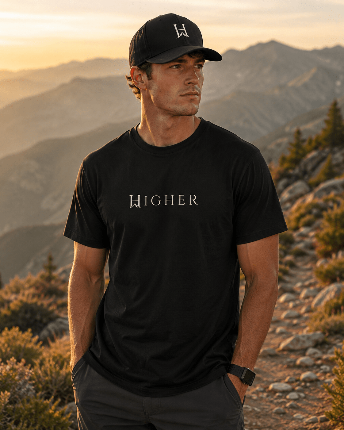 Notorious Flexfit Cap, model wearing the Notorious cap with a Darkborne HIGHER Tee at a mountain overlook.