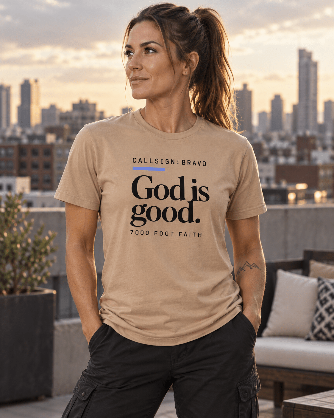 Tan God Is Good CALLSIGN: BRAVO tee — female model outdoors