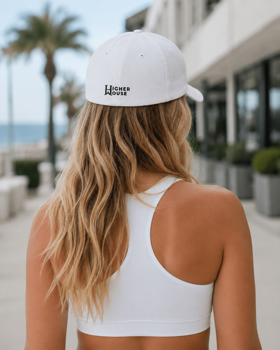 Heritage Flexfit Cap, model wearing the White cap outdoors.