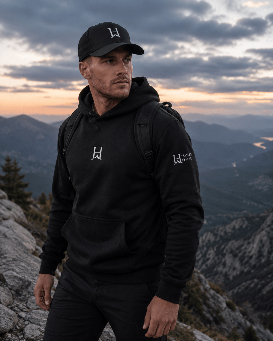 Notorious Flexfit Cap, model wearing the dark cap outdoors.