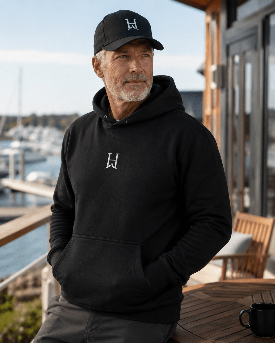 Notorious Flexfit Cap, model wearing the dark cap outdoors.