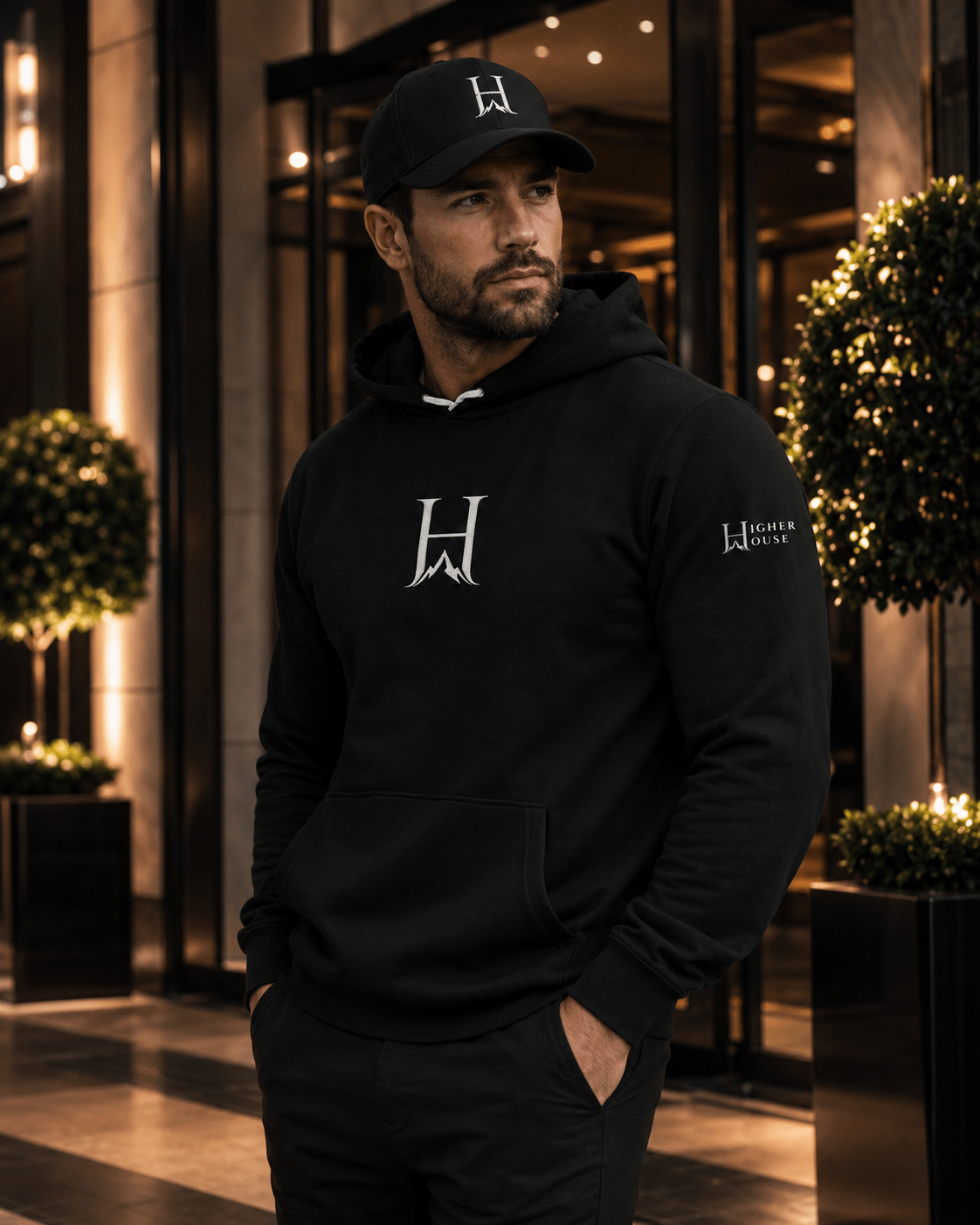 Notorious Flexfit Cap, model wearing the dark cap in the city.