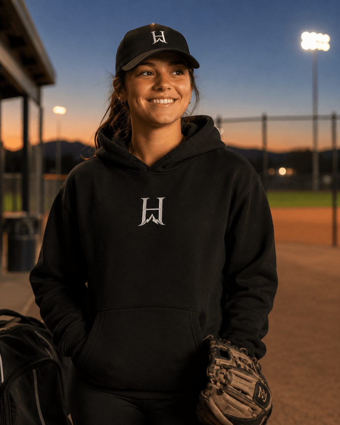 Notorious Flexfit Cap, model wearing the dark cap outdoors.