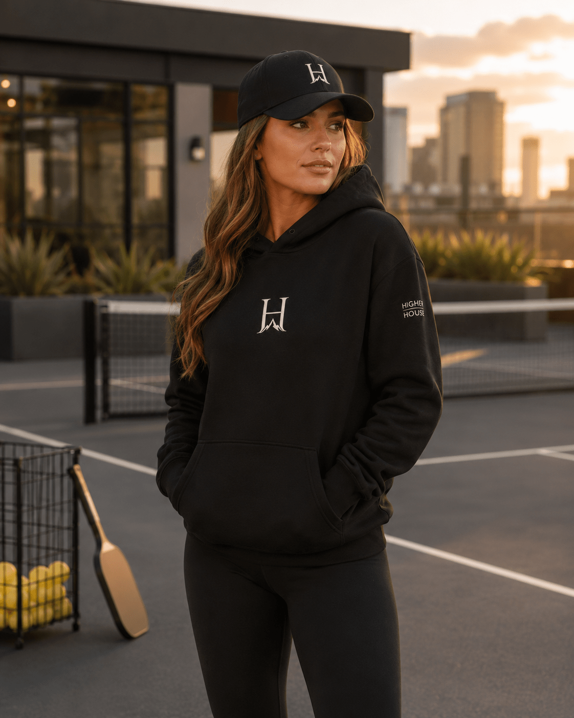 Notorious Flexfit Cap, model wearing the dark cap outdoors.