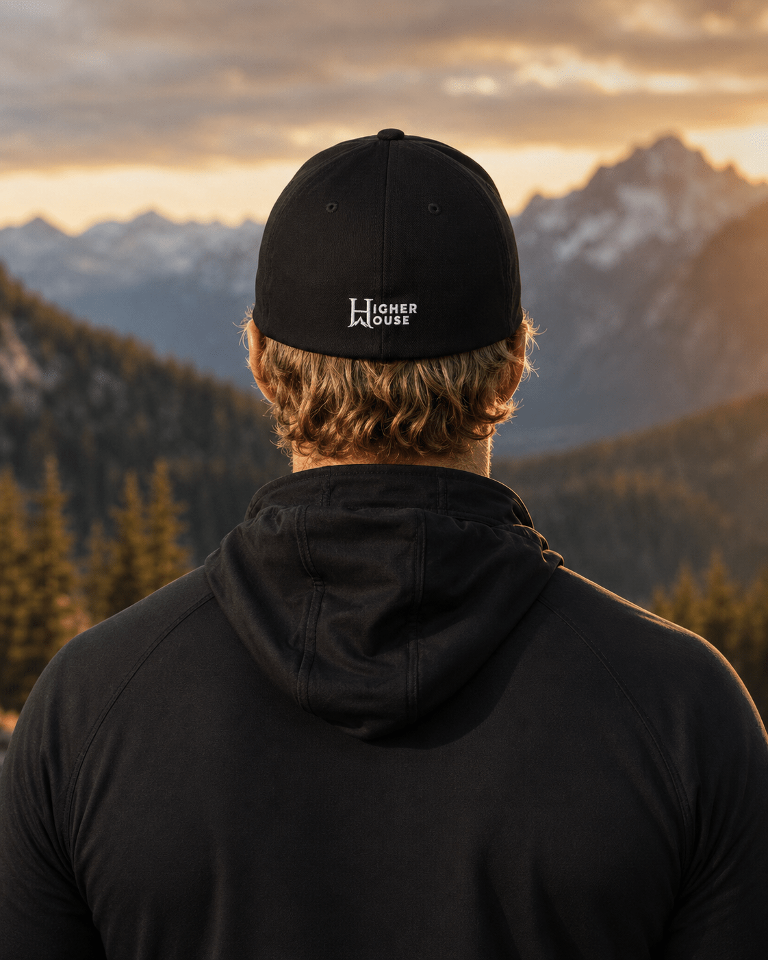 Notorious Flexfit Cap, model wearing the dark cap by the waterfront.