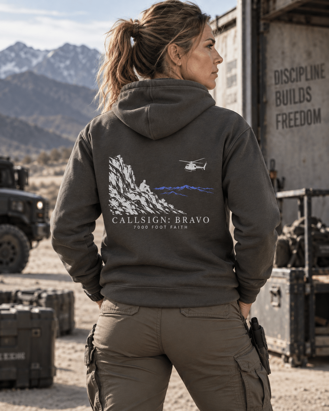 Vintage Black The Approach Silver CALLSIGN: BRAVO hoodie — female model, back view