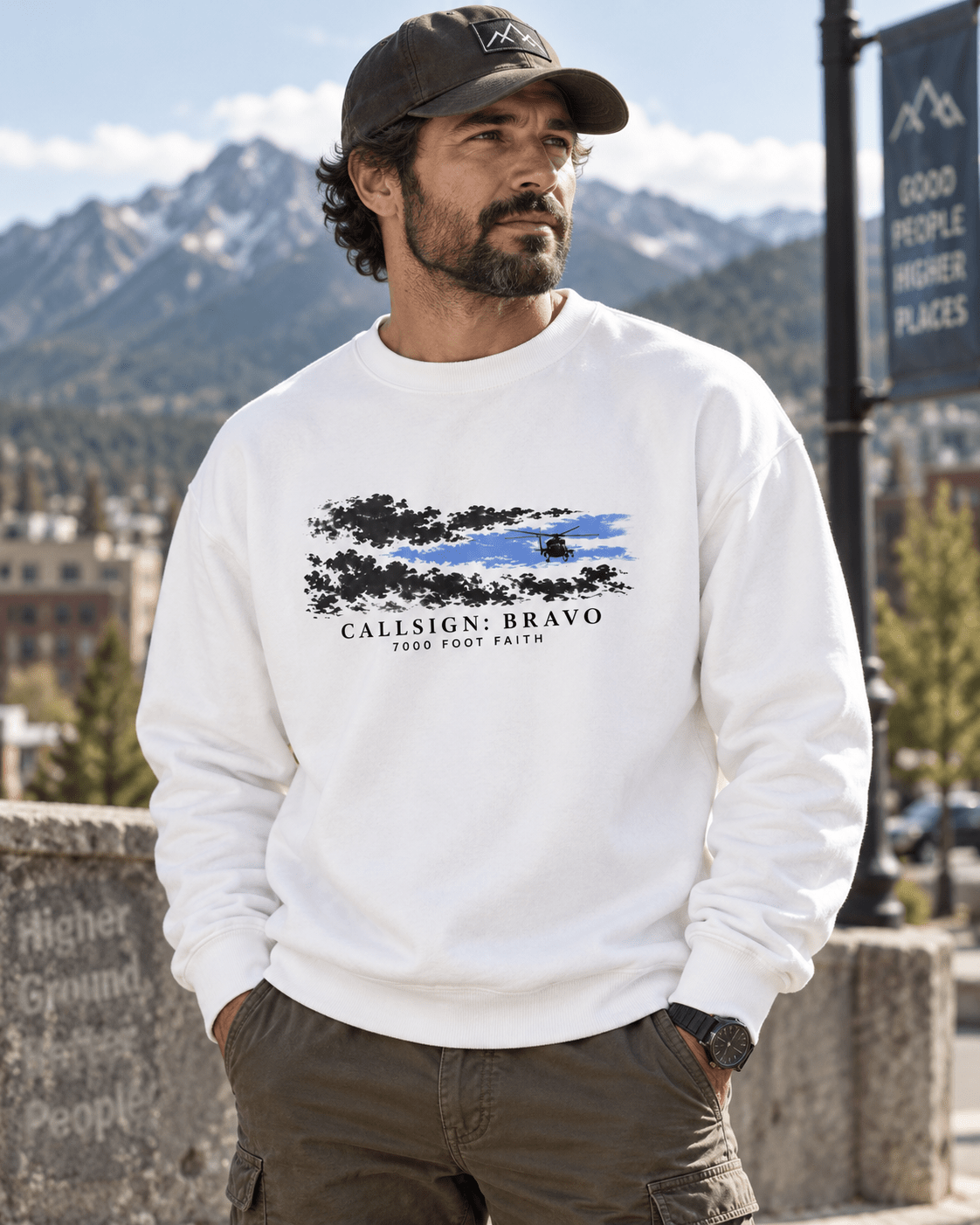 White The Opening CALLSIGN: BRAVO crewneck — male model wearing a cap, front view