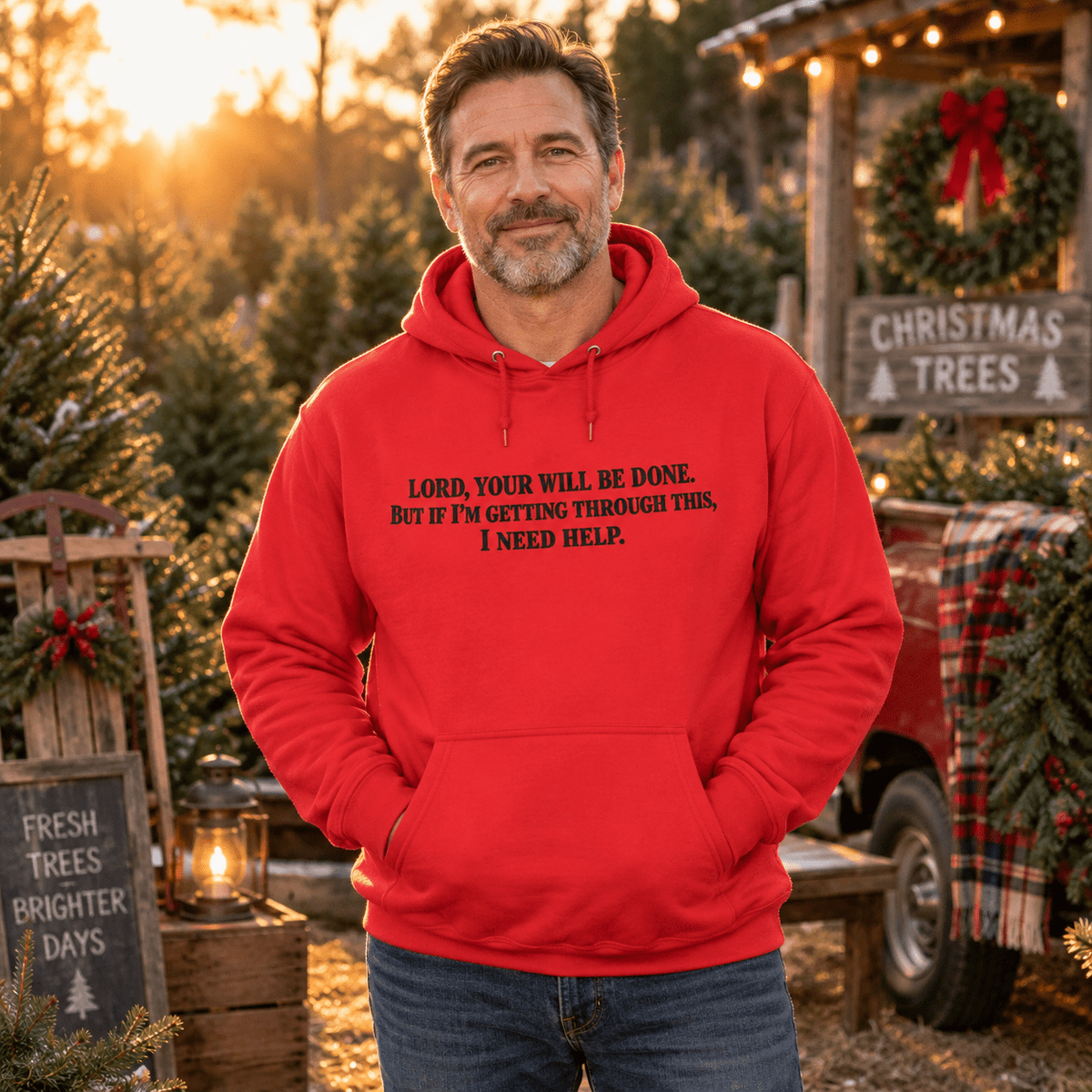 Man wearing a Team Red Your Will Be Done: Descent CALLSIGN: BRAVO hoodie at a Christmas tree lot — front view