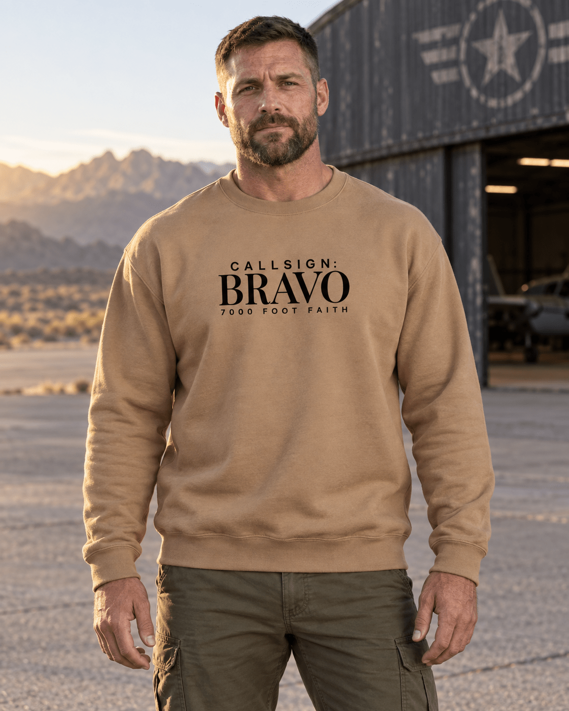 Latte Zagros Ridgeline CALLSIGN: BRAVO crewneck — male model outdoors, front view